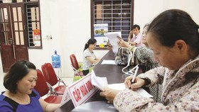 Hóa đơn điện tử dự kiến sẽ được áp dụng rộng rãi vào năm 2018. Ảnh: Thu Hằng.