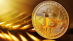 Tiền ảo Bitcoin hiện đang trở nên phổ biến dù tại nhiều quốc gia, đồng tiền này vẫn chưa được chấp nhận (Ảnh minh họa: KT)