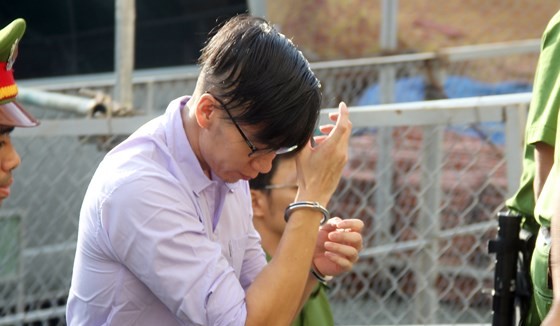 Defendant Nguyen Wiliam Anh escorted to the court