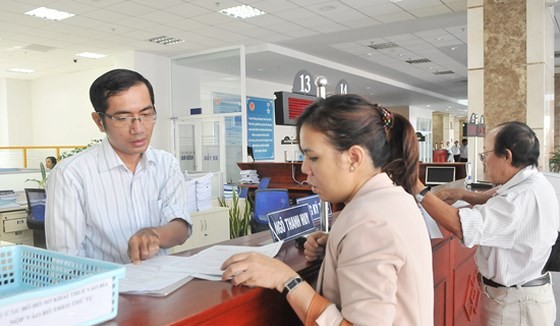 Đăng ký thuế tại Cục Thuế TPHCM. Ảnh: CAO THĂNG