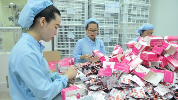 Sản xuất thuốc cung ứng bình ổn thị trường tại Công ty AGIMEXPHARM Ảnh:CAO THĂNG
