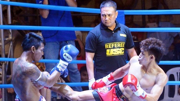 Vietnamese fighter Nguyen Tran Duy Nhat (right). (Photo: news.zing.vn)