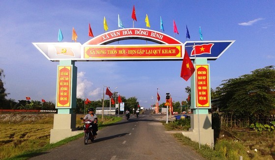 The path leads to Dong BInh Commune in Can Tho City ( Photo: SGGP)