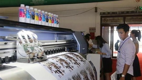 More environmentally friendly solutions for printing is important for the industry's sustainable development, according to a recent conference held in HCM City (Photo: VNA)