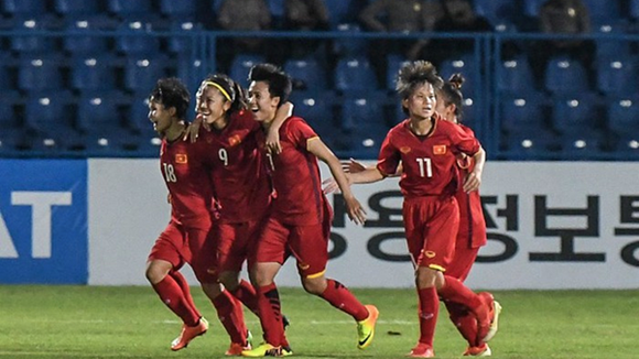 Vietnamese women celebrate their victory over Thailand at the Asian Games in August 2018 (Photo: VNA)