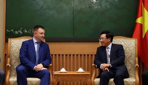 Deputy Prime Minister Pham Binh Minh meets with Head of the Russian Federal Agency for Youth Affairs Alexander Bugayev. (Photo:VGP)