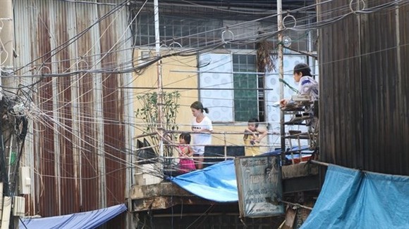 Many residents affected by Thu Thiem New Urban Area project in HCM City’s District 2 are still suffering from poor living conditions in the An Phu Area (Source: VNA)