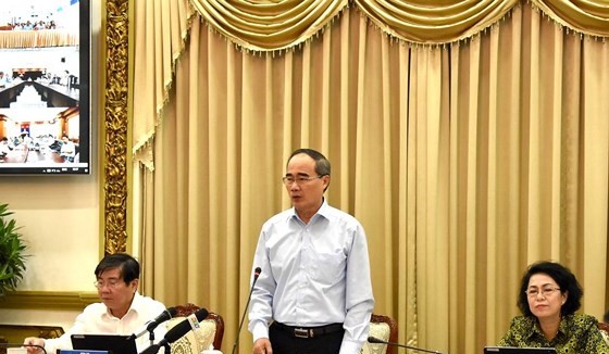 HCMC Party Leader Nguyen Thien Nhan makes a statement at the conference on administrative reform on July 18 (Photo: SGGP)