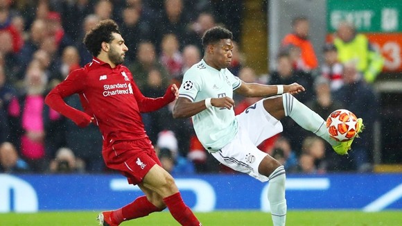 Liverpool (trái) không thể vượt qua Bayern Munich dày dạn kinh nghiệm. Ảnh: Getty Images