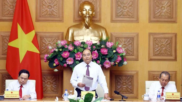 Thủ tướng Nguyễn Xuân Phúc phát biểu tại Hội nghị liên tịch thường niên giữa Chính phủ và Ủy ban Trung ương Mặt trận Tổ quốc Việt Nam. Ảnh: TTXVN