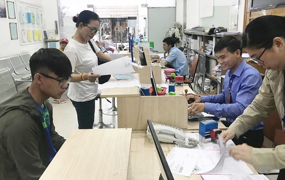 Gỡ bất cập biên chế hành chính cho TPHCM ảnh 1