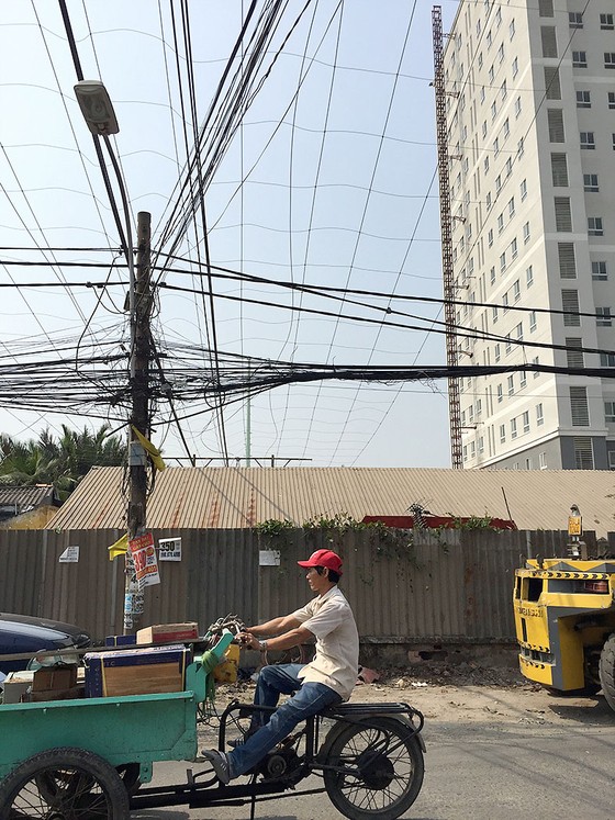 Chuẩn bị điện cho mùa khô: Gỡ vướng đường dây Nam Sài Gòn - quận 8 ảnh 1