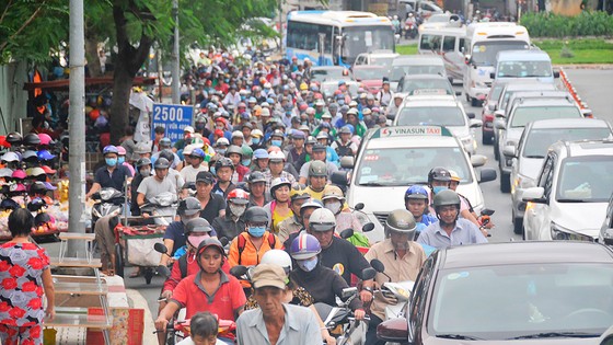 Điều chỉnh quy hoạch chung xây dựng TPHCM - Bài 1: Cuộc đua không cân sức ảnh 1
