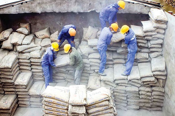 Ngành xây dựng loay hoay thoái vốn ảnh 1