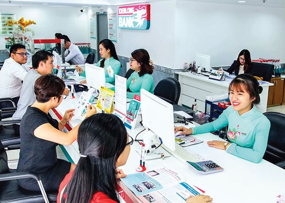 Giảm lãi suất, chờ thanh khoản ảnh 1