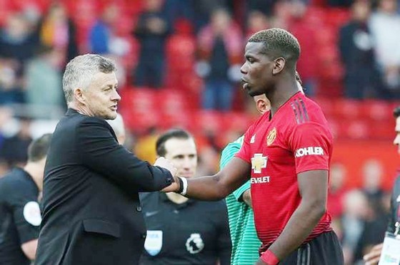 HLV Ole Gunnar Solskjaer nháº­n ÄÆ°á»£c cam káº¿t tá»« Paul Pogba. áº¢nh: Getty Images    