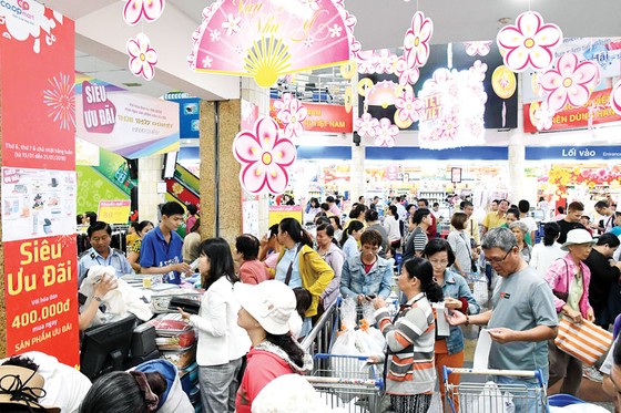 Hệ thống siêu thị Co.opmart và Co.opXtra cam kết giảm giá hơn 5.000 sản phẩm tết ảnh 1