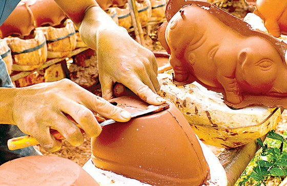 Nghề làm heo đất ảnh 2