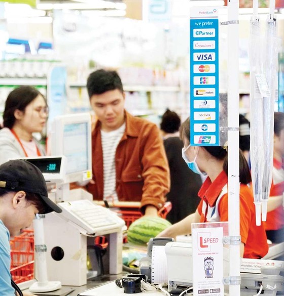 Hướng tới thanh toán không dùng tiền mặt - Bài 1: Trào lưu thanh toán chạm, quẹt ảnh 1
