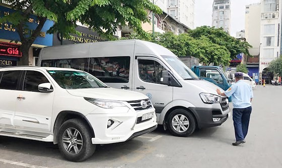 Tăng phí nước thải, thu phí đậu xe lũy tiến theo giờ ảnh 1
