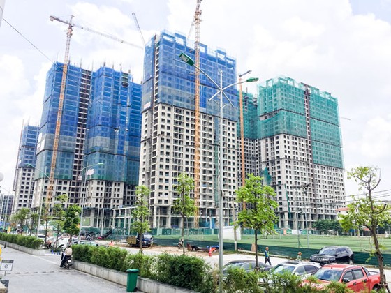 Ngân hàng bảo lãnh nhà ở hình thành trong tương lai - Doanh nghiệp địa ốc kêu khó ảnh 1