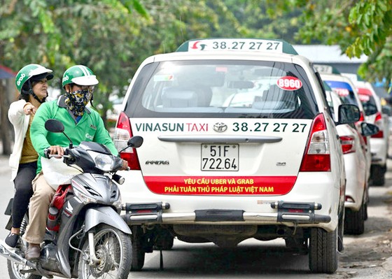 Grab phải bồi thường Vinasun hơn 4,8 tỷ đồng ảnh 1