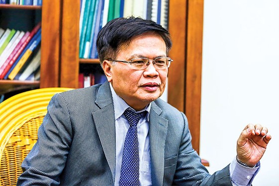 Kinh tế thị trường phải dứt khoát ảnh 1