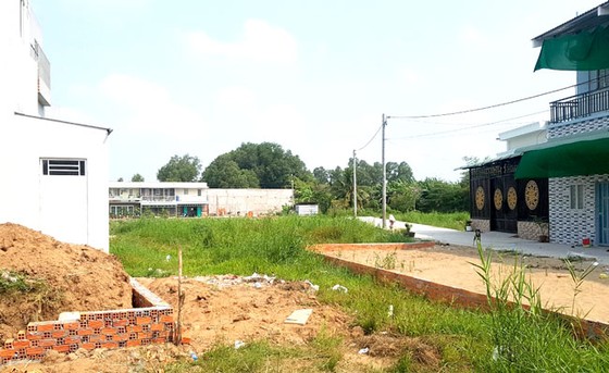 Lúng túng xử lý khu dân cư tự phát ảnh 1