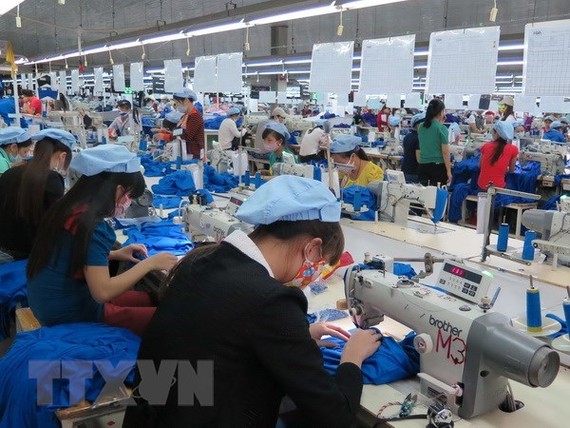In 2017, the garment-textile sector raked in $31.2 billion from exports, a year-on-year rise of 10.23 percent (Photo: VNA)