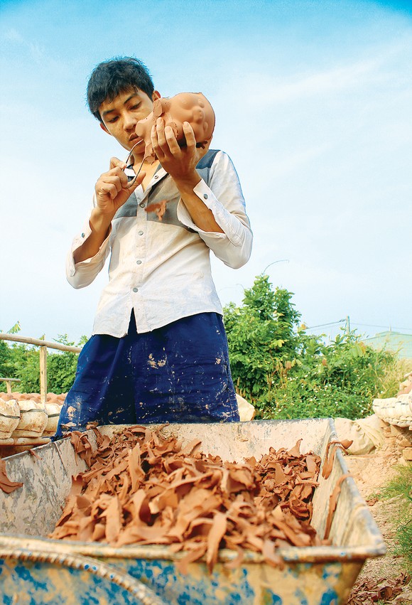 Nghề làm heo đất ảnh 1