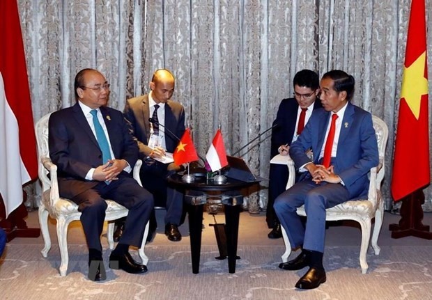 PM meets with leaders on sidelines of 34th ASEAN Summit ảnh 1