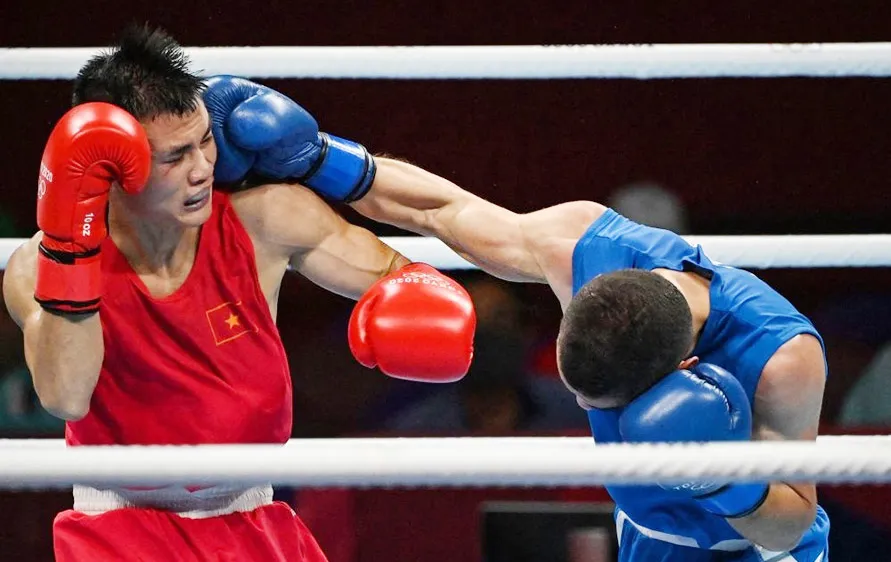 Nguyễn Văn Đương (trái). Ảnh: Getty