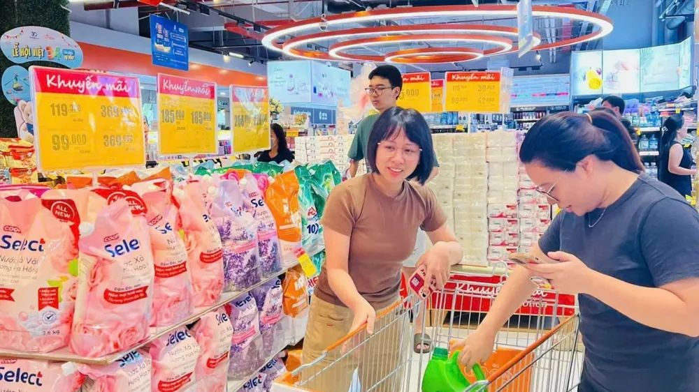  Các nhà bán lẻ tăng cường tổ chức nhiều hoạt động kích cầu (ẢNH: MINH CHÂU)