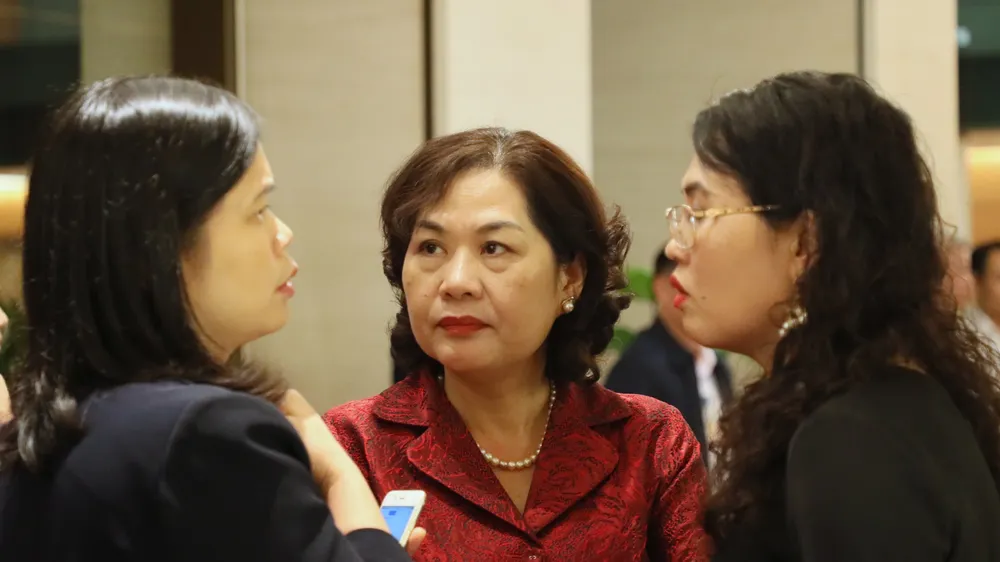 Bà Nguyễn Thị Hồng (giữa). Ảnh: QUANG PHÚC 
