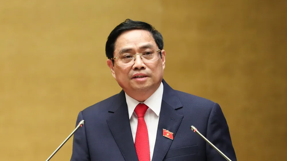 Thủ tướng Chính phủ Phạm Minh Chính trình bày Tờ trình về cơ cấu số lượng thành viên Chính phủ khóa XV. Ảnh: QUANG PHÚC