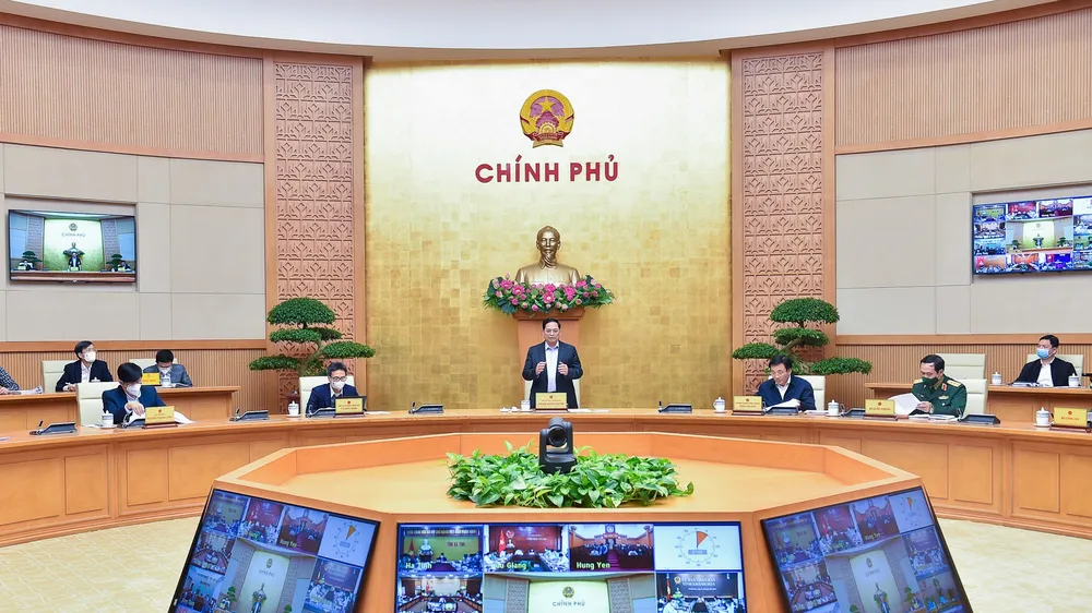Thủ tướng Phạm Minh Chính chủ trì họp Chính phủ về phòng chống dịch. ẢNH: VIẾT CHUNG