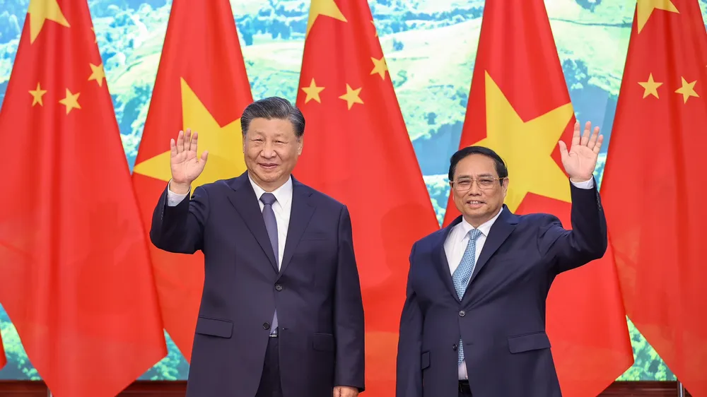 Thủ tướng Phạm Minh Chính và Tổng Bí thư, Chủ tịch nước Trung Quốc Tập Cận Bình chụp ảnh chung. Ảnh: VIẾT CHUNG