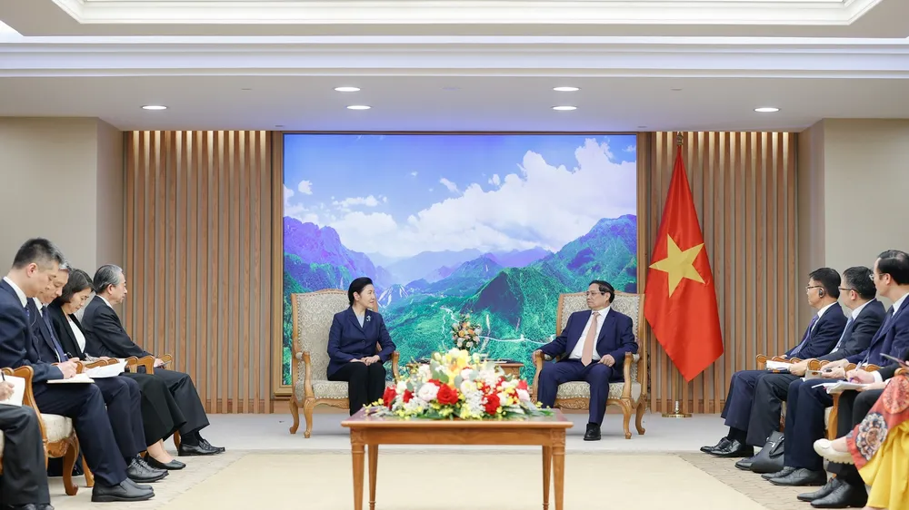 Thủ tướng Phạm Minh Chính tiếp Bộ trưởng Tư pháp Trung Quốc Hạ Vinh, chiều 19-4. Ảnh: VIẾT CHUNG