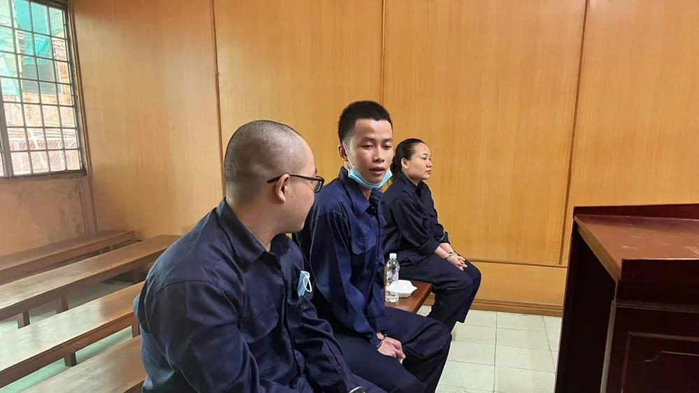 Ba bị cáo tại tòa trong phiên xét xử sơ thẩm.