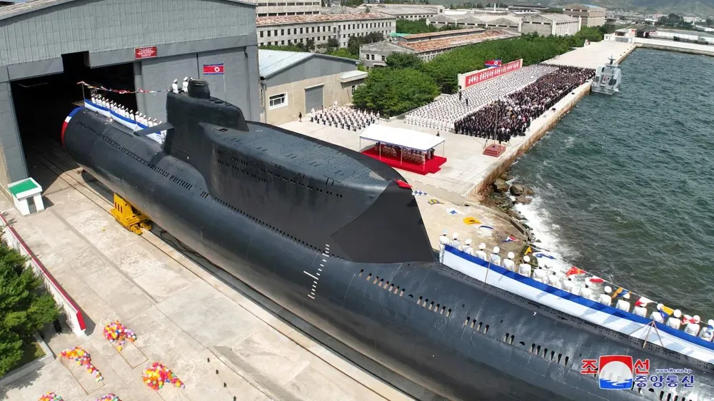 Sự kiện mà KCNA đưa tin là lễ hạ thủy tàu ngầm tấn công mang vũ khí hạt nhân chiến thuật mới, trong bức ảnh được phát hành hôm 8-9 - Ảnh: KCNA