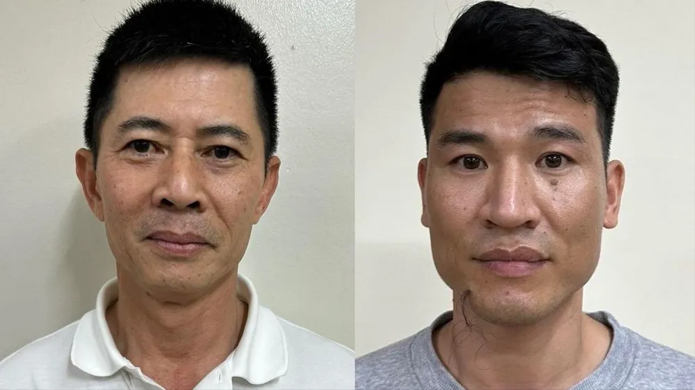 Bị can Nguyễn Duy Hưng (Chủ tịch HĐQT Tập đoàn Thuận An, bìa trái) và Trần Anh Quang (Tổng Giám đốc Tập đoàn Thuận An)
