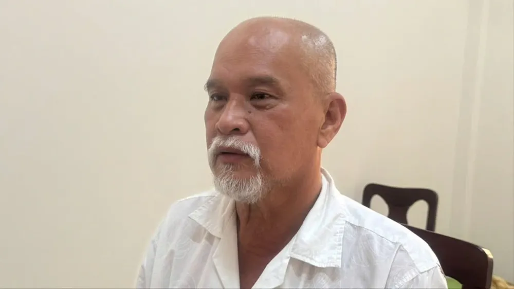 Trần Văn Hiếu Minh tại cơ quan công an.
