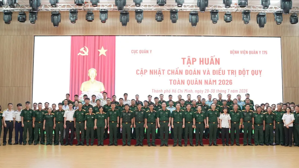 Các học viên chụp hình lưu niệm tại buổi tập huấn Ảnh: TRẦN CHÍNH