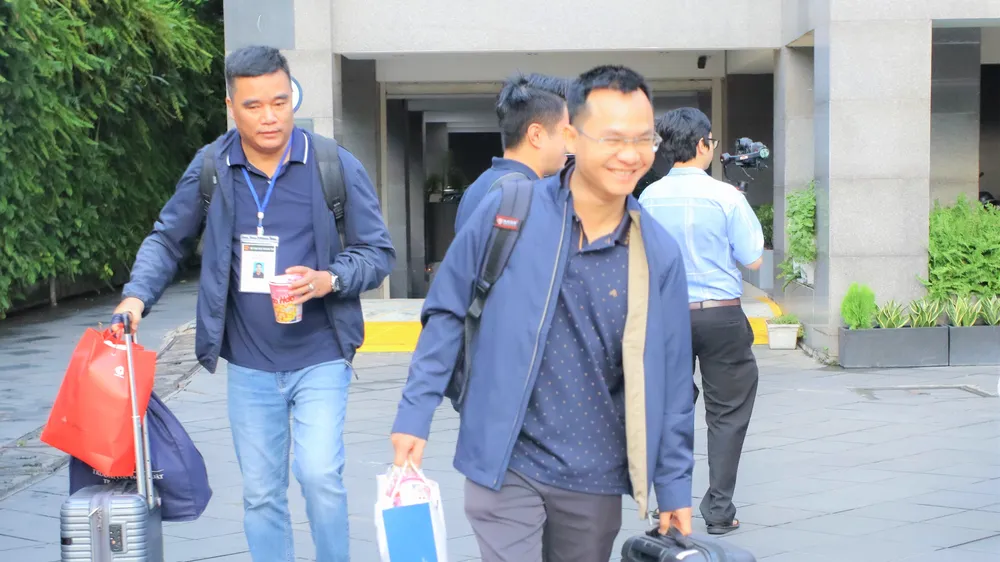 Cán bộ giảng viên của Trường ĐH Luật TPHCM lên đường phục vụ kỳ thi tốt nghiệp THPT tại tỉnh Lâm Đồng. Ảnh: THANH HÙNG