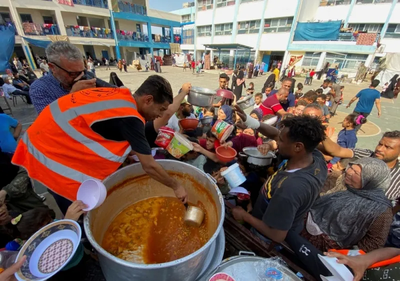 Cứu trợ lương thực cho người dân tại Dải Gaza Ảnh: REUTERS