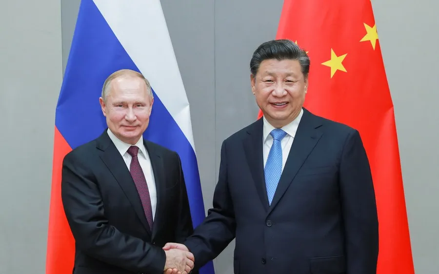 Tổng thống Vladimir Putin và Chủ tịch Tập Cận Bình. Ảnh: TÂN HOA XÃ 
