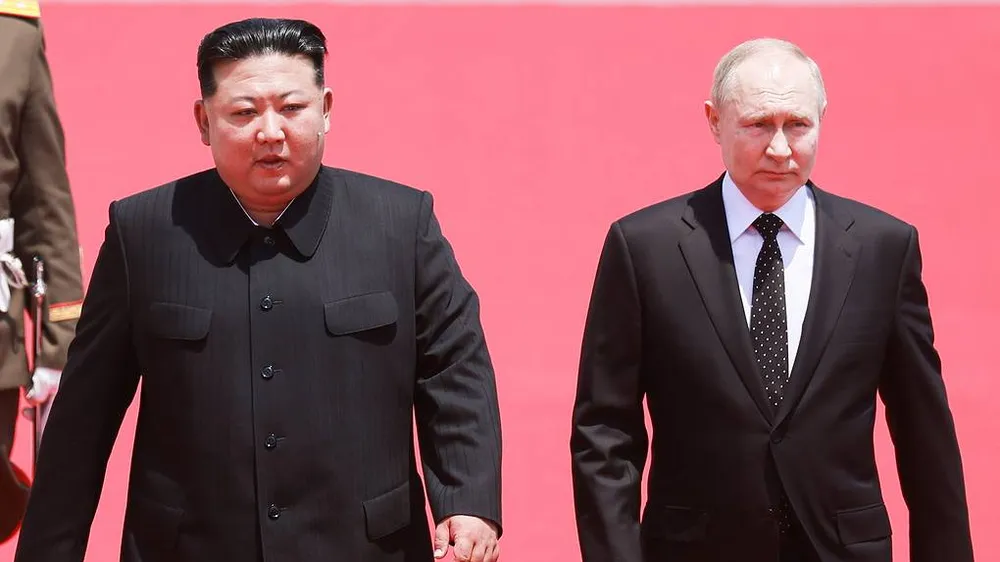 Nhà lãnh đạo Triều Tiên Kim Jong-un và Tổng thống Nga Putin. Ảnh: TASS