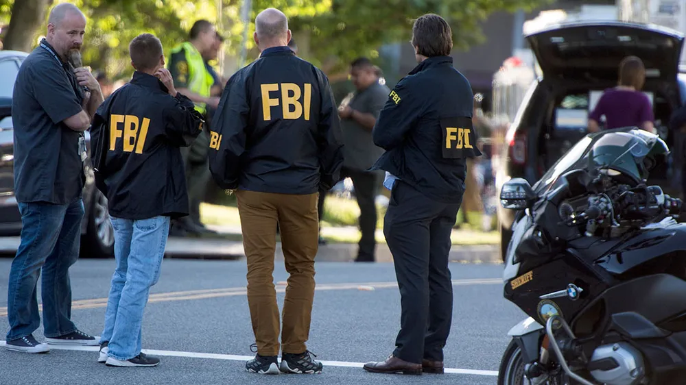 Lực lượng FBI. Ảnh: Orange County Register