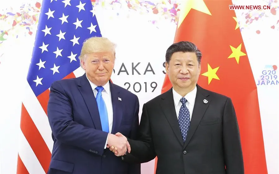 Tổng thống đắc cử Mỹ Donald Trump và Chủ tịch nước Trung Quốc Tập Cận Bình trong một cuộc gặp tại Osaka, Nhật Bản năm 2019. Ảnh: TÂN HOA XÃ 