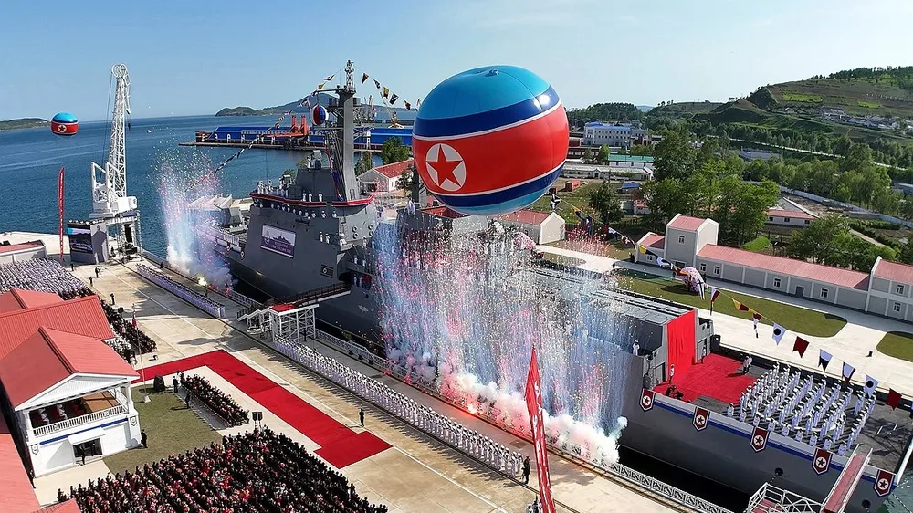 Lễ hạ thủy tàu khu trục 5.000 tấn của Triều Tiên. Ảnh: KCNA/YONHAP